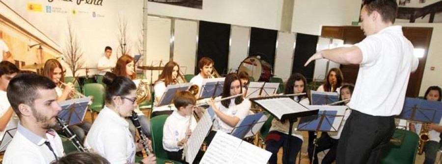 CAMBADOS-La Xuntanza de Bandas Infantís llena el Salón de Peña de música y público
