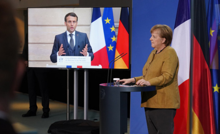Macron y Merkel urgen a subir la producción europea de vacunas