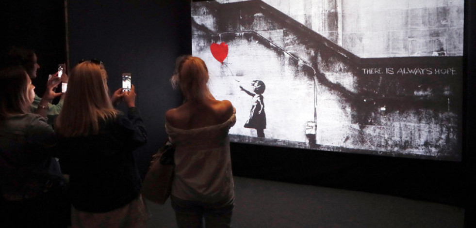 Una obra de Banksy se autodestruye tras ser subastada