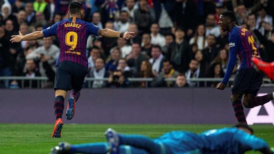 El Barça más práctico ejerce de campeón en el Bernabéu