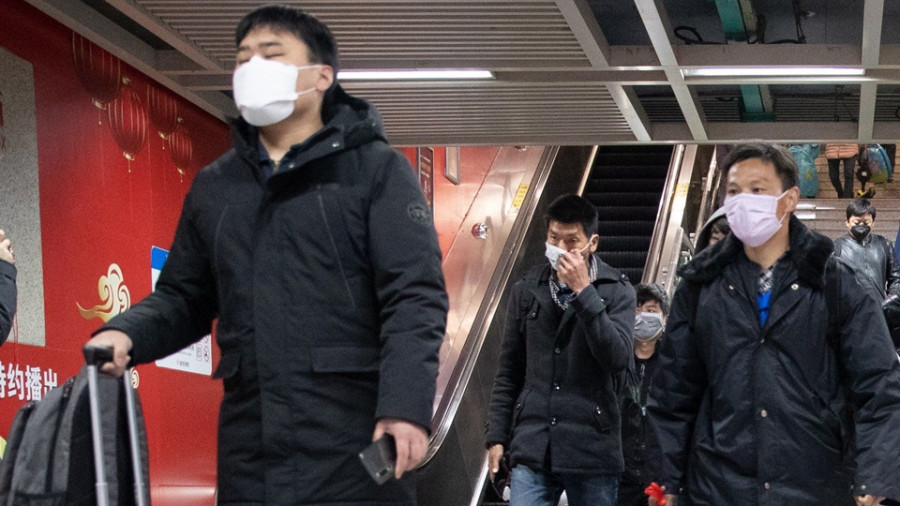 Wuhan, cuna de la pandemia echa a andar, mientras China mira a sus fronteras con recelo
