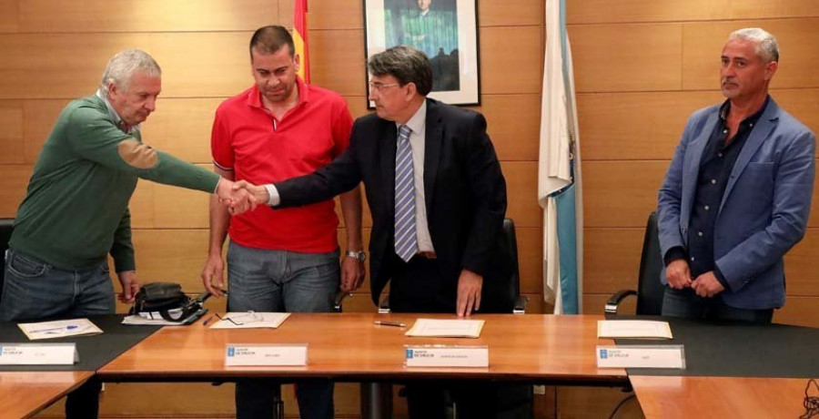 La Xunta firma con tres sindicatos el pacto que “cierra” la huelga de justicia