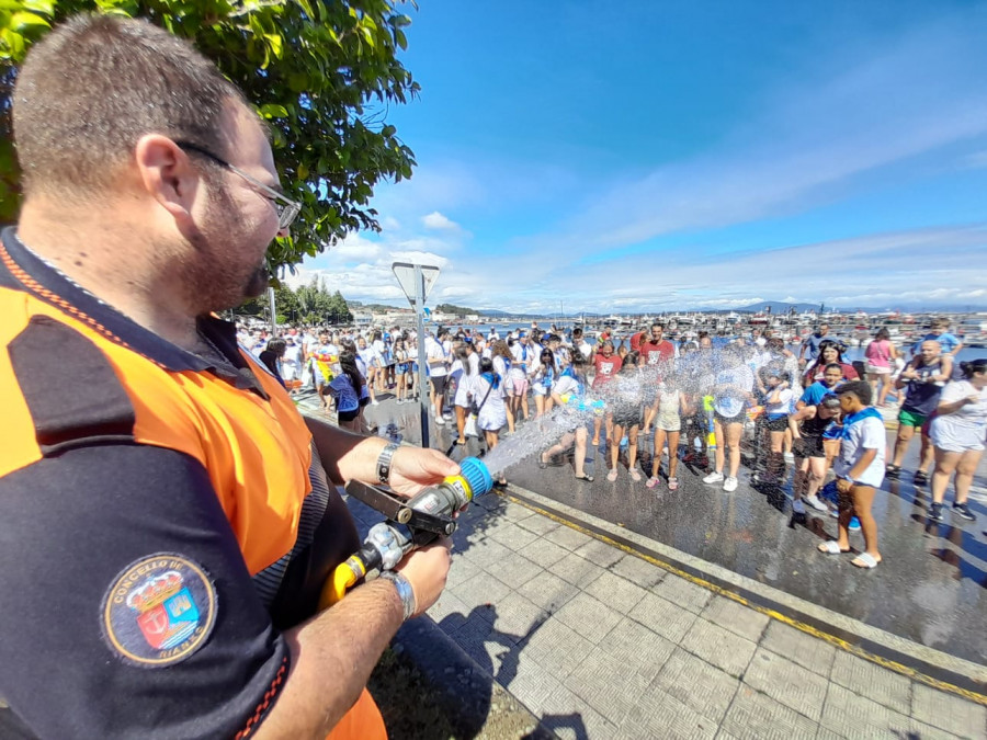 Reportaje | Una marea humana y de agua por los San Juerguines