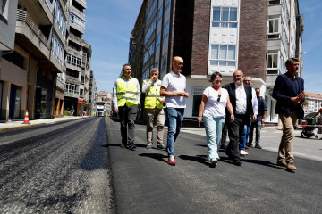 Asfaltado juan carlos I políticos