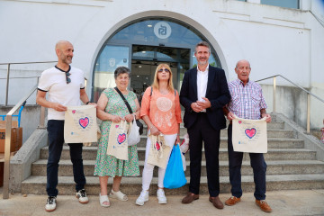 Entrega merchandising praza de abastos vilagarcía